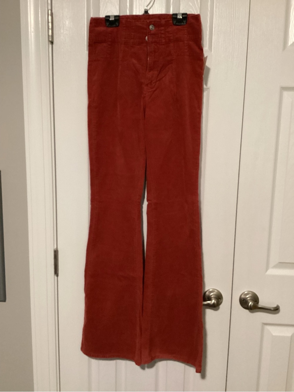 We The Free Corduroy High-Rise Flare Jeans in Rust
